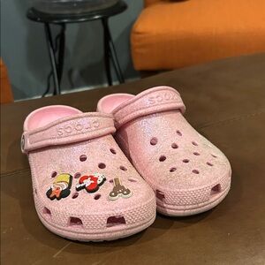 CROCS Kids Pink Glitter Clogs with Charms size J3
